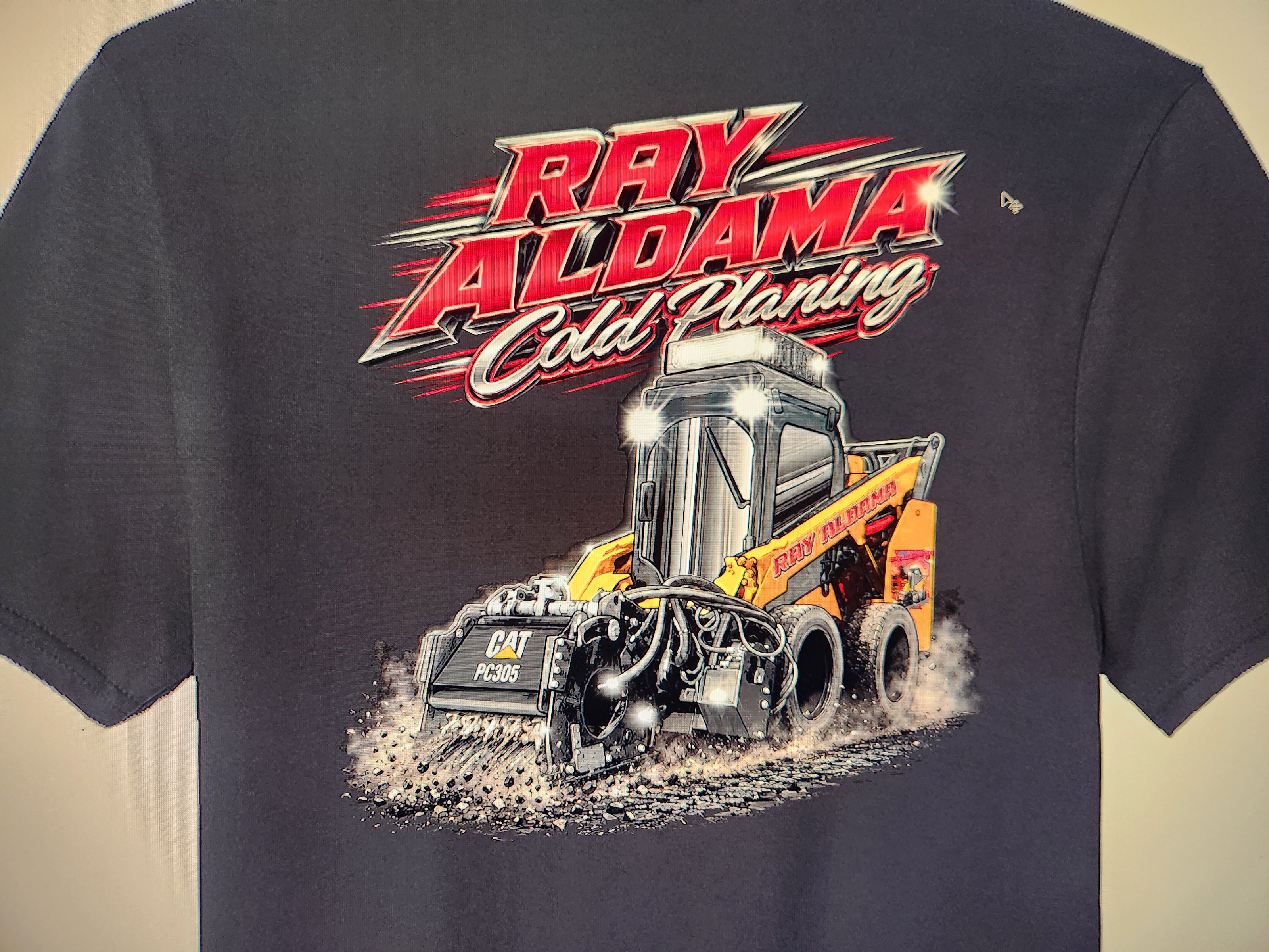Full-color DTF printed construction equipment design on a black shirt